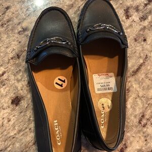 Like new Coach black loafers size 11.